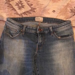 Buckle boot cut jeans